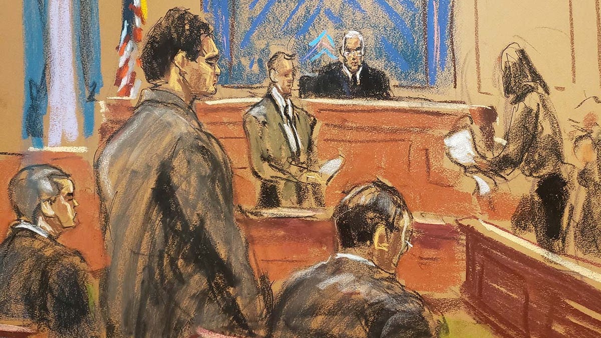 FTX-oprichter Sam Bankman-Fried staat op als de juryvoorzitter het vonnis voorleest in zijn fraudezaak