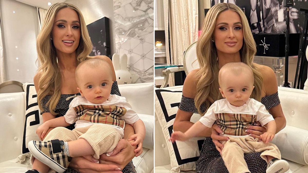 Paris Hitlon houdt zoon Phoenix vast in een Burberry-outfit op twee foto's